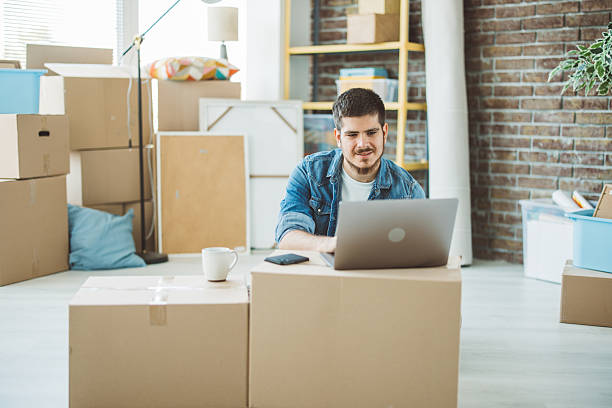 istock Young man just moved in new apartment 2230589421