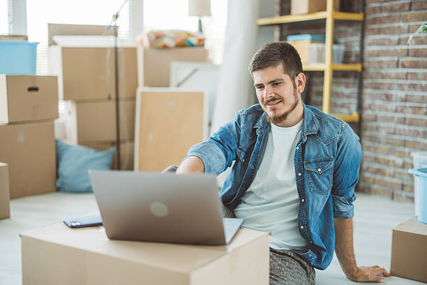 istock Young man just moved in new apartment 2230589629
