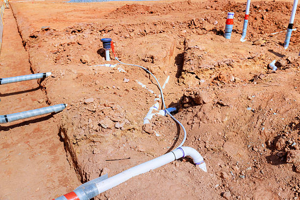 istock Construction site with newly installed plumbing drainage systems in residential area 2230589877