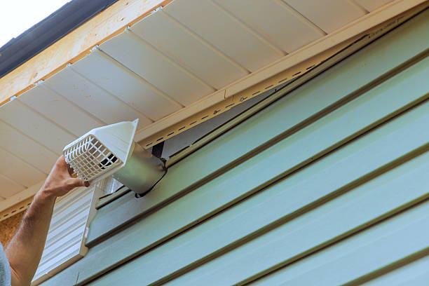 istock Properly installing vent cover on exterior wall for efficient ventilation in residential home during works day 2230589903