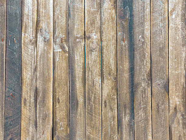 istock Textured wooden planks arranged vertically, showcasing natural grain patterns and rustic charm, ideal for backgrounds and design projects with copy space 2230590119