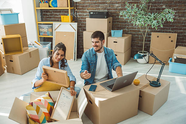 istock Friends just moved in new apartment 2230590705