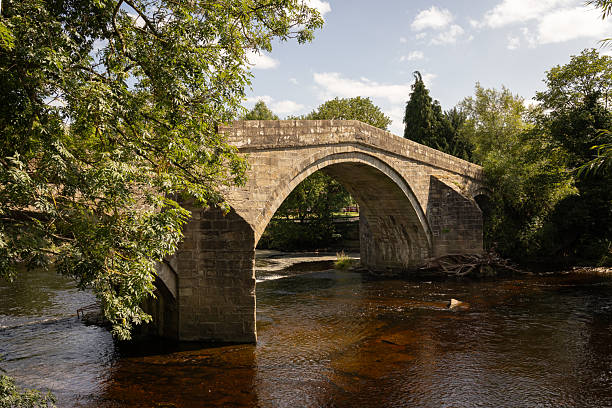 The Old Stone Bridge, also known as the packhorse bridge, over the River Wharfe in Ilkley, West Yorkshire