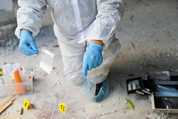 istock Crime Scene Professional Examining Area In Abandoned Building 2230601671