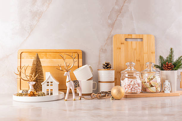 istock Kitchen background with kitchen utensils decorated for the holiday with cutting boards, marshmallows in glass jars for the New Year and Christmas. 2230604363