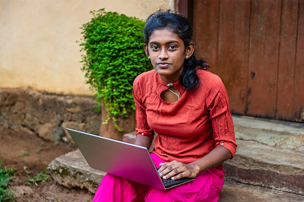 istock Sri Lankan young woman using a laptop 2230607421