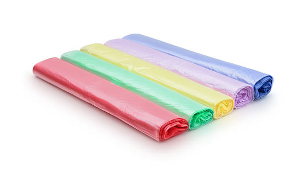 istock Multi-colored rolls of plastic bags isolated. 2230612143