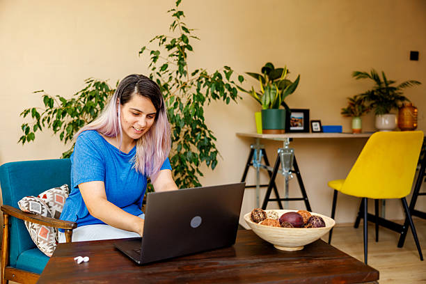 istock Cozy Afternoon Indoors with Laptop 2230615963