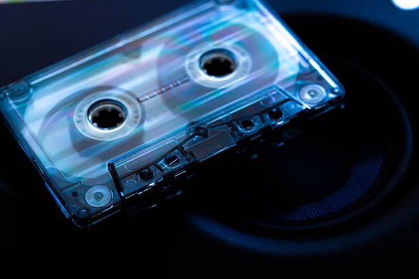 istock Transparent Audio Cassette on a Dark Background 2230618663