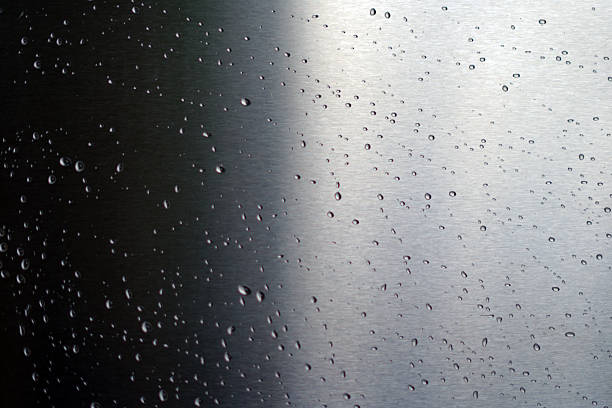 istock Closeup Waterdrops on Metal Surface in High Resolution 2230619844