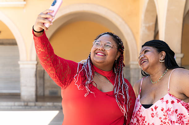 istock Mother and daughter taking a selfie on vacation 2230620710