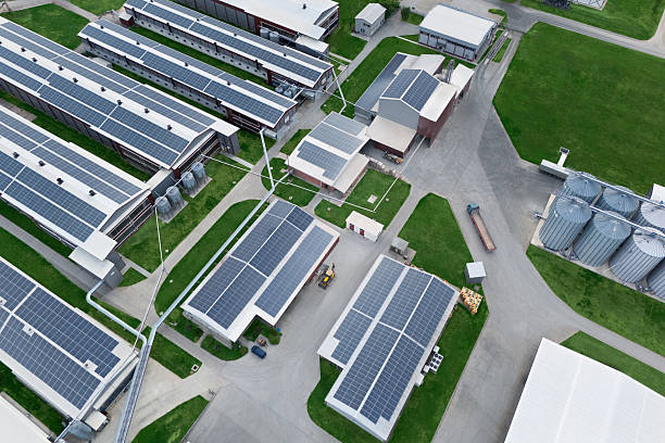 istock Modern poultry farm with solar panels. Factory using renewable energy. 2230622171