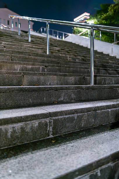 istock Urban Night Staircase with Stainless Steel Handrails 2230623196