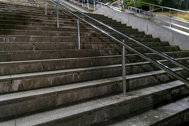 istock Urban Night Staircase with Stainless Steel Handrails 2230623202