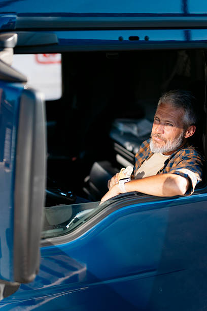 istock Truck driver relaxing in cabin during break 2230629834