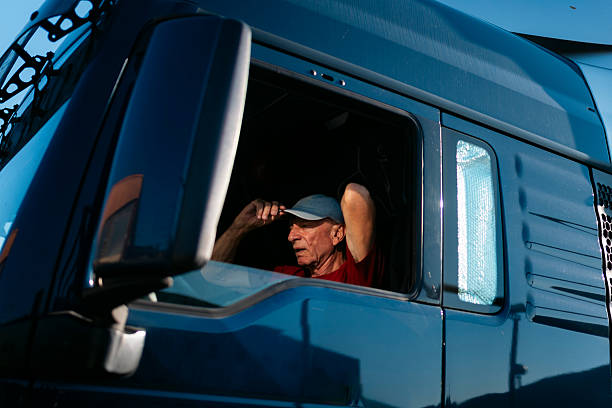 istock Senior truck driver relaxing in his cabin during a break 2230629865