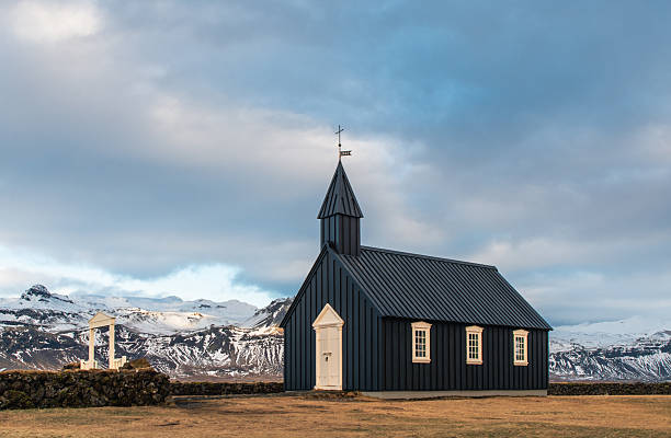 istock Icelandic Black Church Silhouette at Sunset 2230630351