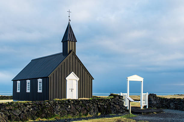 istock Icelandic Black Church Silhouette at Sunset 2230630446