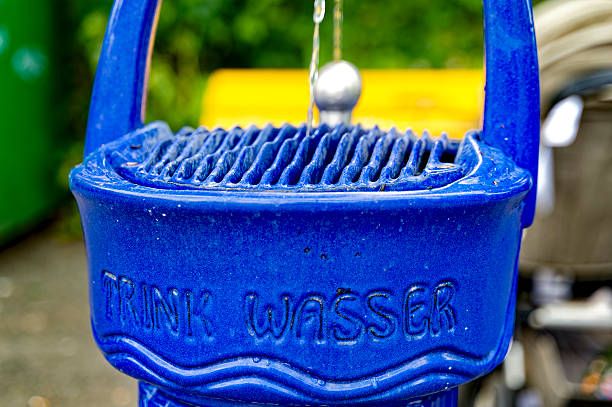 Drinking fountain with a pathway beyond.