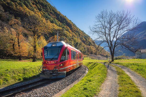 istock Bernina Express train in sunny autumn valley, Switzerland 2230639050