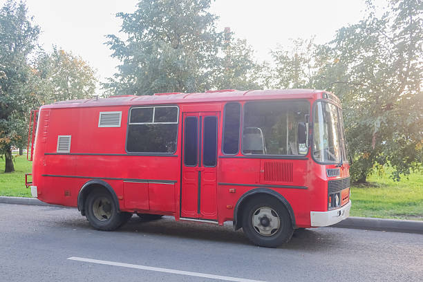 istock Red bus parked on the street 2230643283