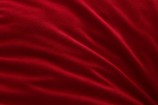 istock Red Fabric with Soft Folds and Texture 2230644635