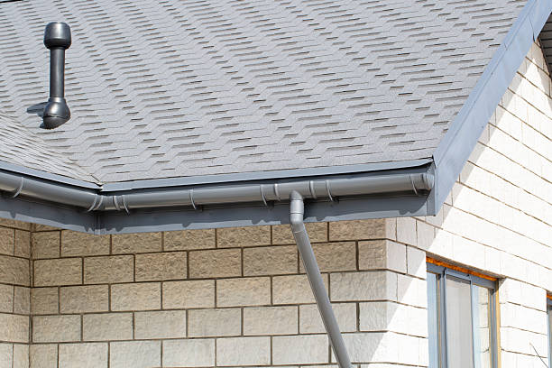 istock Modern guttering on a modern roof. Roof drainage. 2230649381