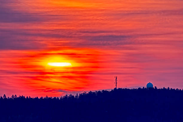 Transmission towers at sunrise on the Saanich Peninsula on Vancouver Island, British Columbia
