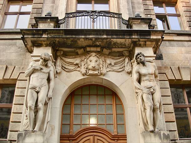 istock Ornate Building Facade with Sculpted Figures in Sicily, Italy 2230658999