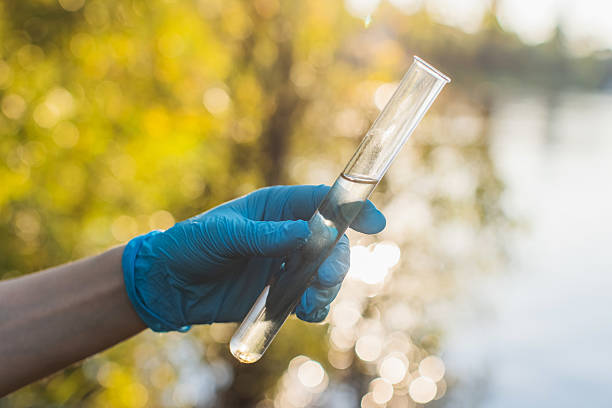 istock Analysis of water in river. Test tube 2230662917