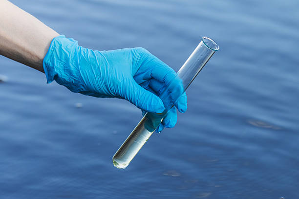 istock Analysis of water in river. Test tube 2230662922
