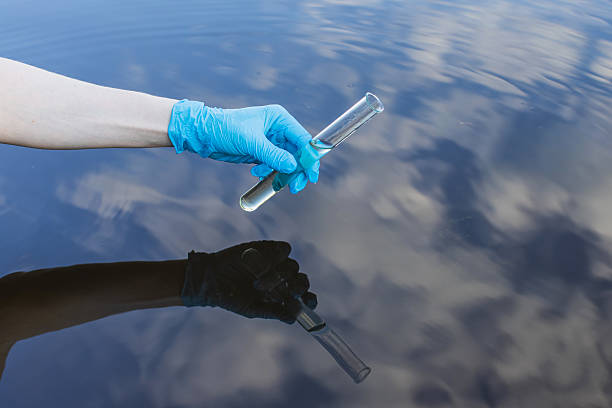 istock Analysis of water in river. Test tube 2230662928