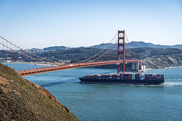 istock Cargo ship passing Golden Gate Bridge in San Francisco 2230665518