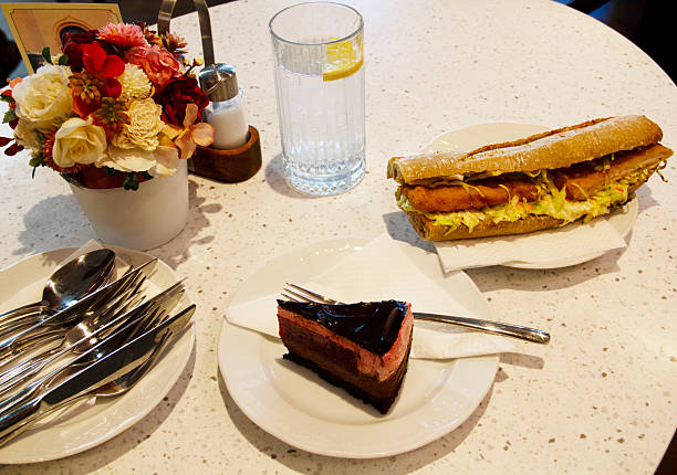 Multicultural Austrian–American–Hungarian–French Style Schnitzel Baguette And Cake As Fusion Cuisine As Backgrounds Made By Coffeehouse In Kecskemet Historic City Center Hungary Lunch And Special Dessert For Tourists In Central And Eastern Europe