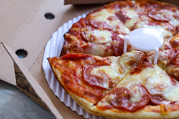 istock Pepperoni pizza in a pizza box. 2230670252