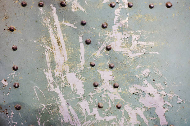 istock Abstract background made of metal paneling with rivets. 2230672472