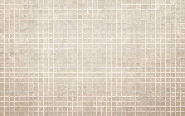 istock Cream light ceramic wall and floor tiles mosaic background. Simple seamless abstract surface clean. 2230672946