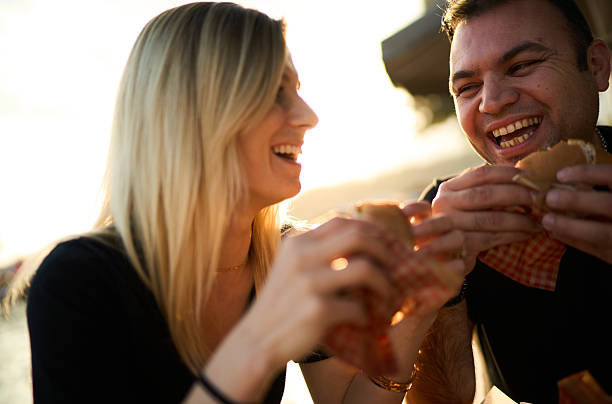 istock Happy couple dining outdoors at weekend event, Turkey 2230674634