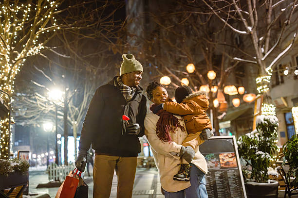 istock A Happy Family Outing Enjoying the Night Lights 2230678627
