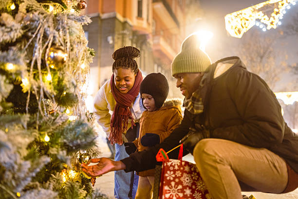 istock Magical Evening Family Christmas Tree Decoration 2230678632