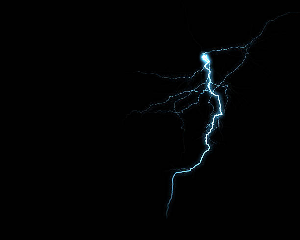 istock A single, brilliant blue-white lightning bolt vividly cuts through the absolute darkness, capturing an intense natural electric discharge. 2230682135