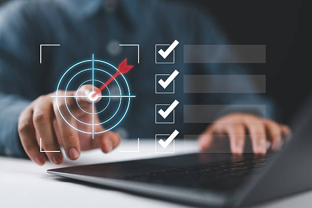 istock Business goal setting and task management. Businessman interacts with a digital checklist and target icon, representing productivity, goal achievement, and strategic planning. 2230683237