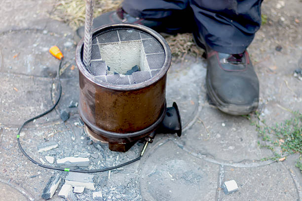 istock Close-up of a damaged truck's DPF, diesel particulate filter. 2230686996