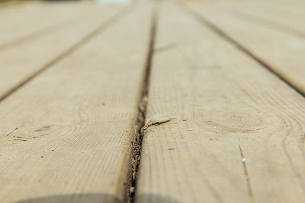 Wood, floor. Side view, close up, sand color.