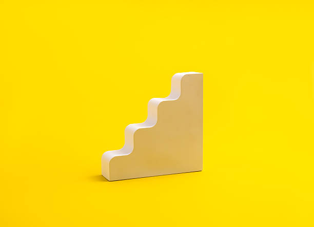 istock Minimal empty white 3D staircase block on bright yellow background, symbolizing business growth graph, progress, and success, perfect for concepts of corporate development and upward achievement. 2230694615