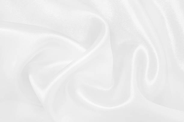 istock White fabric texture for background and design, beautiful pattern of silk or linen. 2230706387