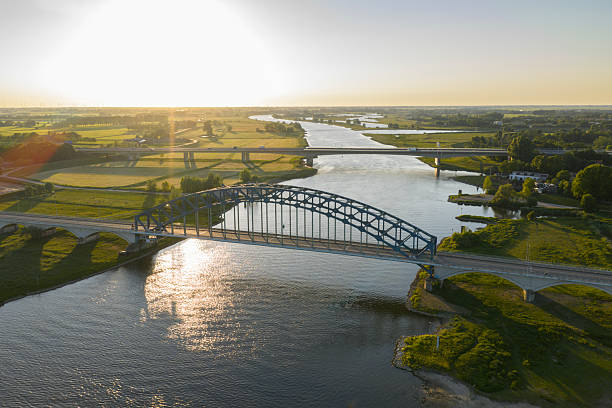 istock Bridge in a springtime colorful sunset over the river IJssel 2230708050