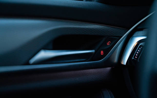 istock Car door lock and unlock buttons with illuminated symbols 2230709796