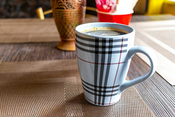 Coffee cup on wooden bench or table background in Leninskiy Rayon Brest Brest District Brest Region Belarus.