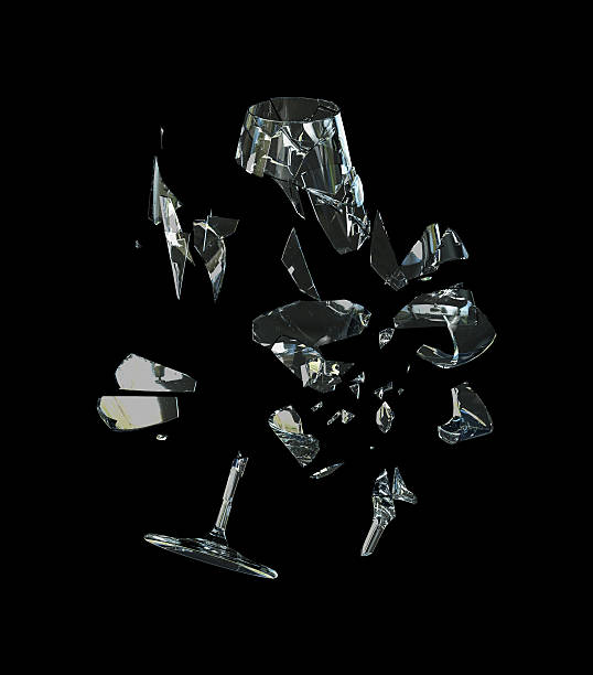 istock Shattered Wine Glass with Scattered Shards on Black Background 2230714149